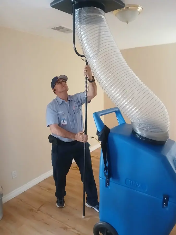 HVAC Installation technician using HEPA equipment in Bemiss